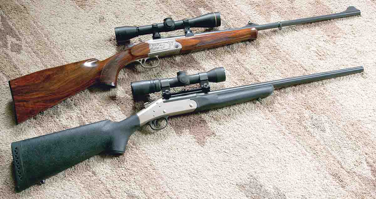 The Merkel (top) weighs almost a pound less than the Handi-Rifle (bottom) despite having a fancy walnut stock instead of a light composite.